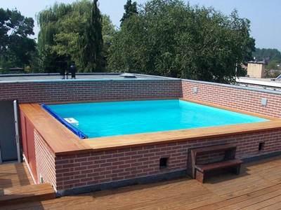 Super geïsoleerde Swimstream ARTH-Pool op het dak - kindveilige afdekking en 10 cm geïsoleerde wanden - in hartje Utrecht.